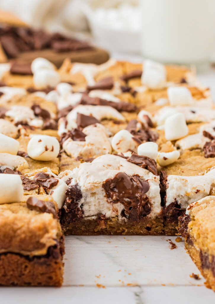 s'mores cookie bars with one slice removed