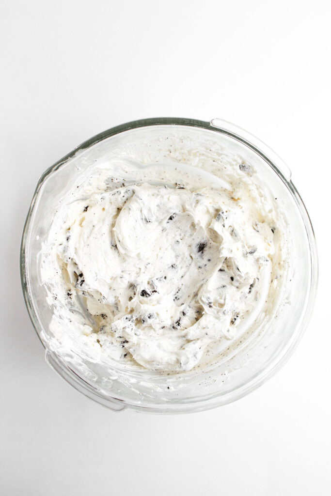 oreo cheesecake dip in glass bowl