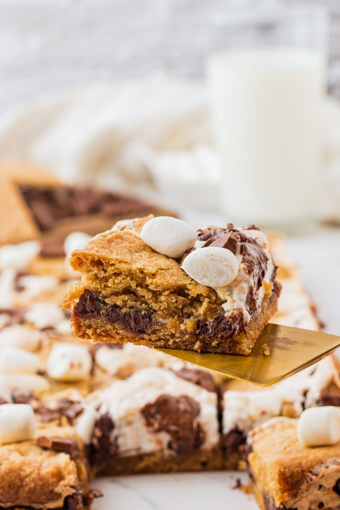 s'mores cookie bar slice on spatula
