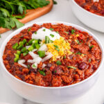 slow cooker chili in white bowl