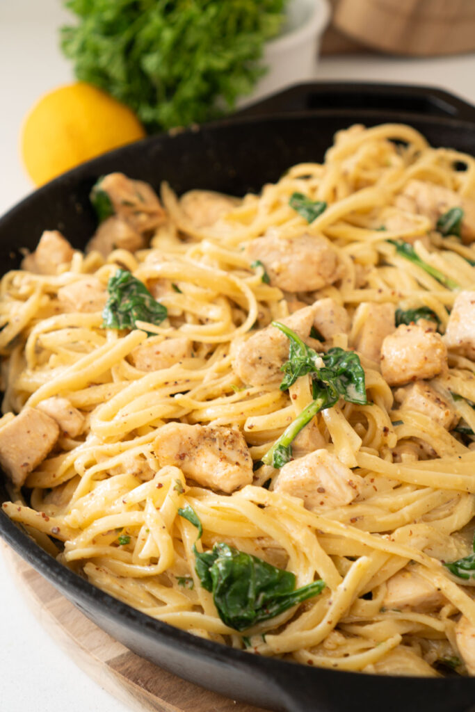 cowboy butter chicken pasta in cast iron skillet