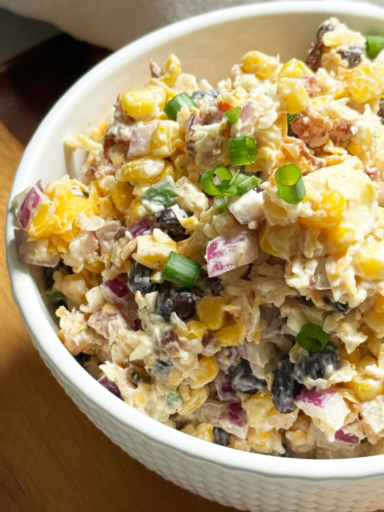 cowboy corn dip in white bowl