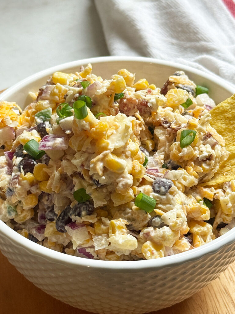 cowboy corn dip in white bowl