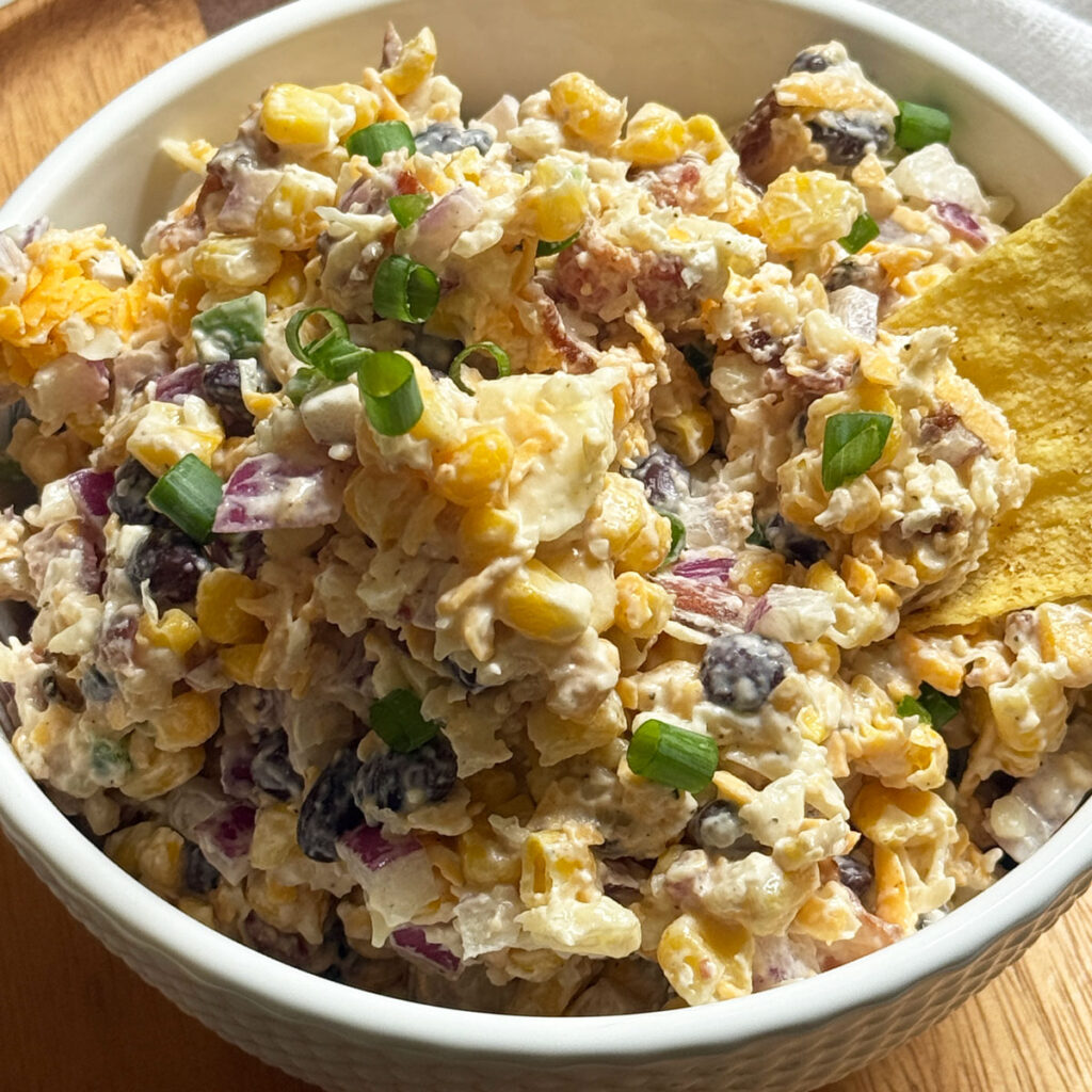 cowboy corn dip in white bowl