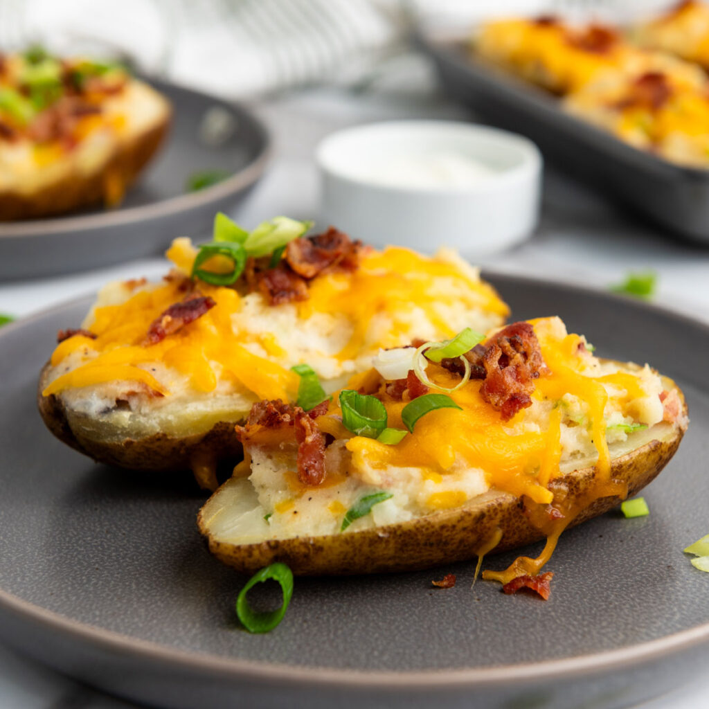 twice baked potatoes on grey plate