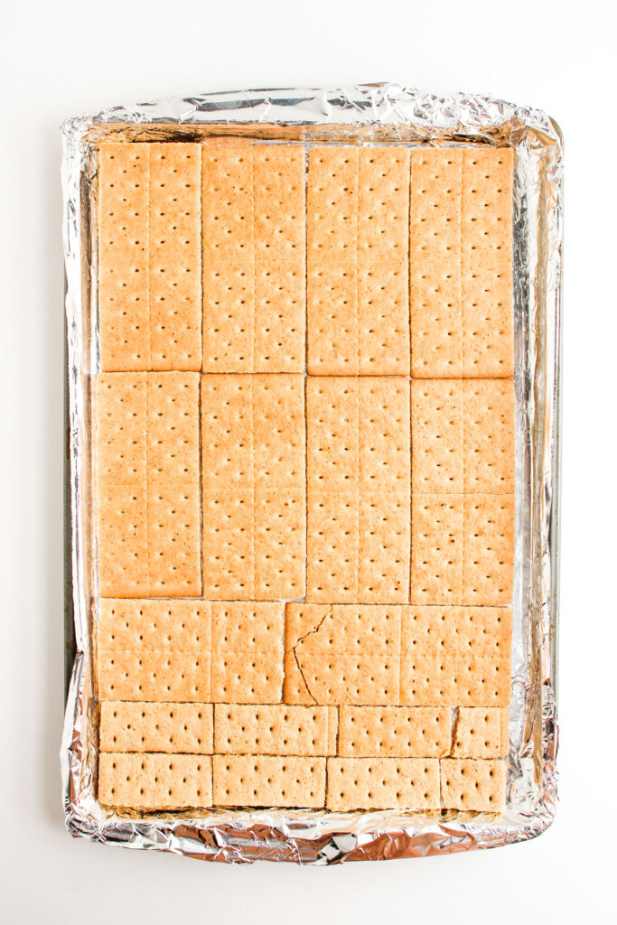 graham crackers on baking sheet for pecan pie bark