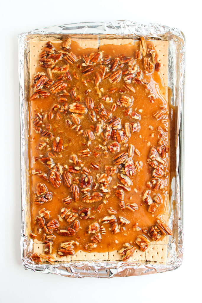 pecan pie bark before hardening on cookie sheet