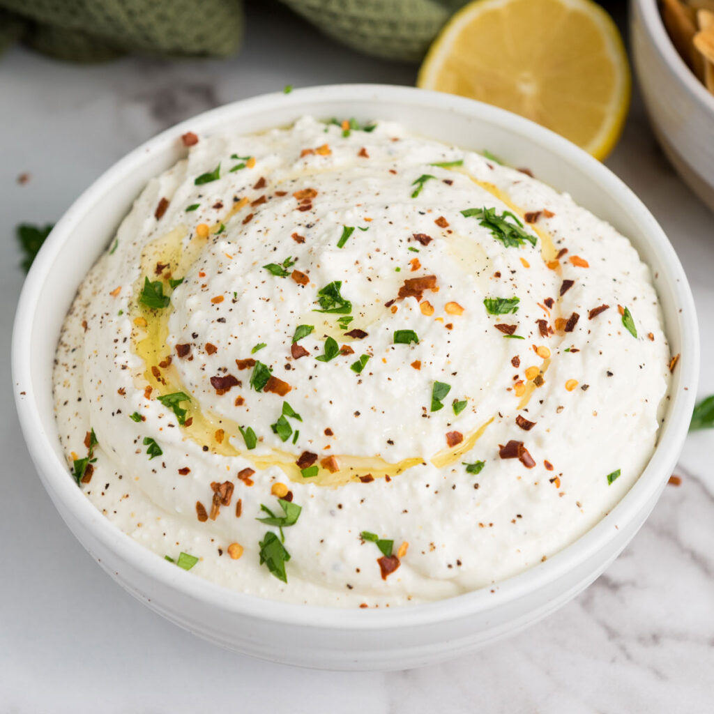 whipped feta sip in white bowl