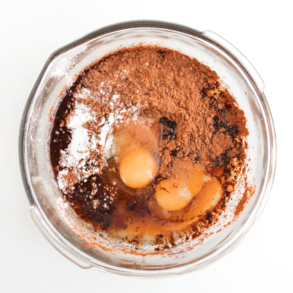 brownie ingredients in glass bowl before mixing