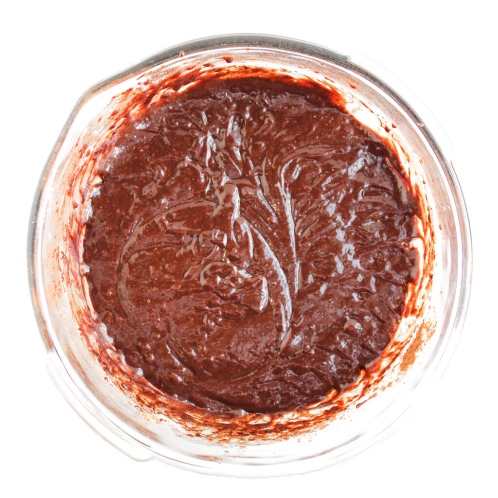 brownie batter in glass bowl