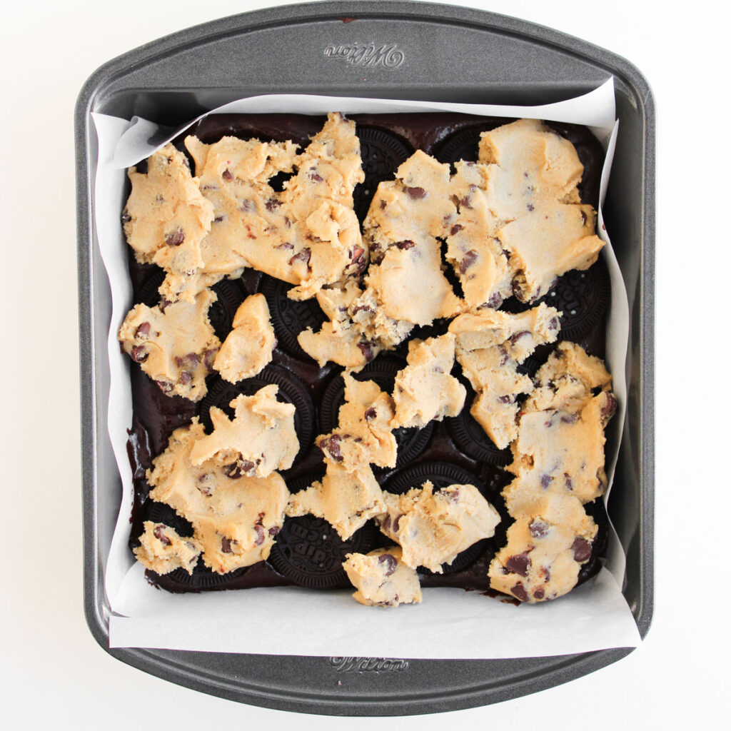 brownie batter with cookie dough chunks on top