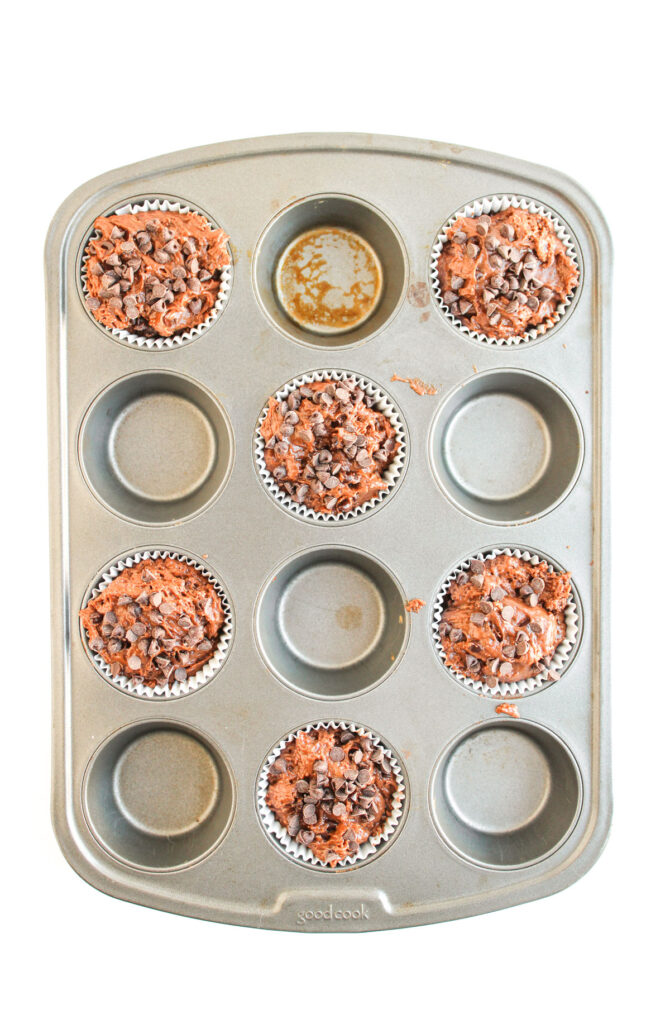 chocolate muffins in muffin pan before baking