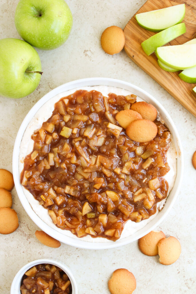easy apple pie dip in white bowl with apples and nilla wafers