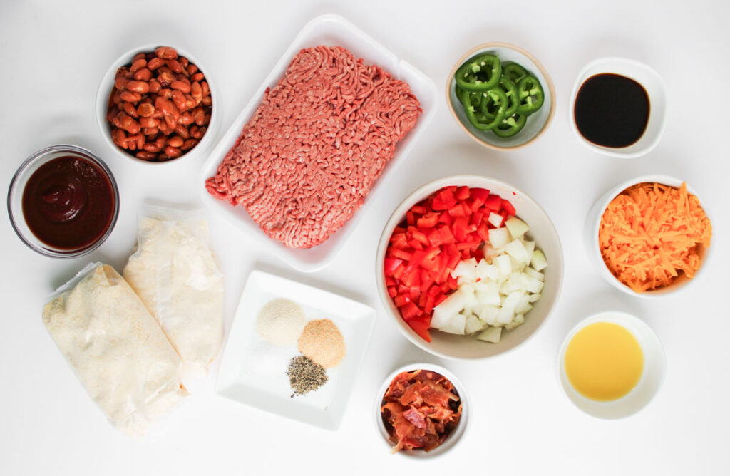 cowboy casserole ingredients in bowls on countertop