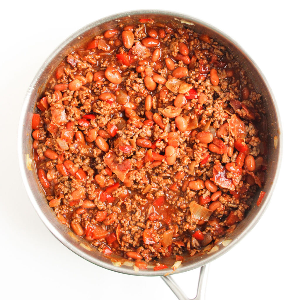 meat and beans in skillet for cowboy casserole