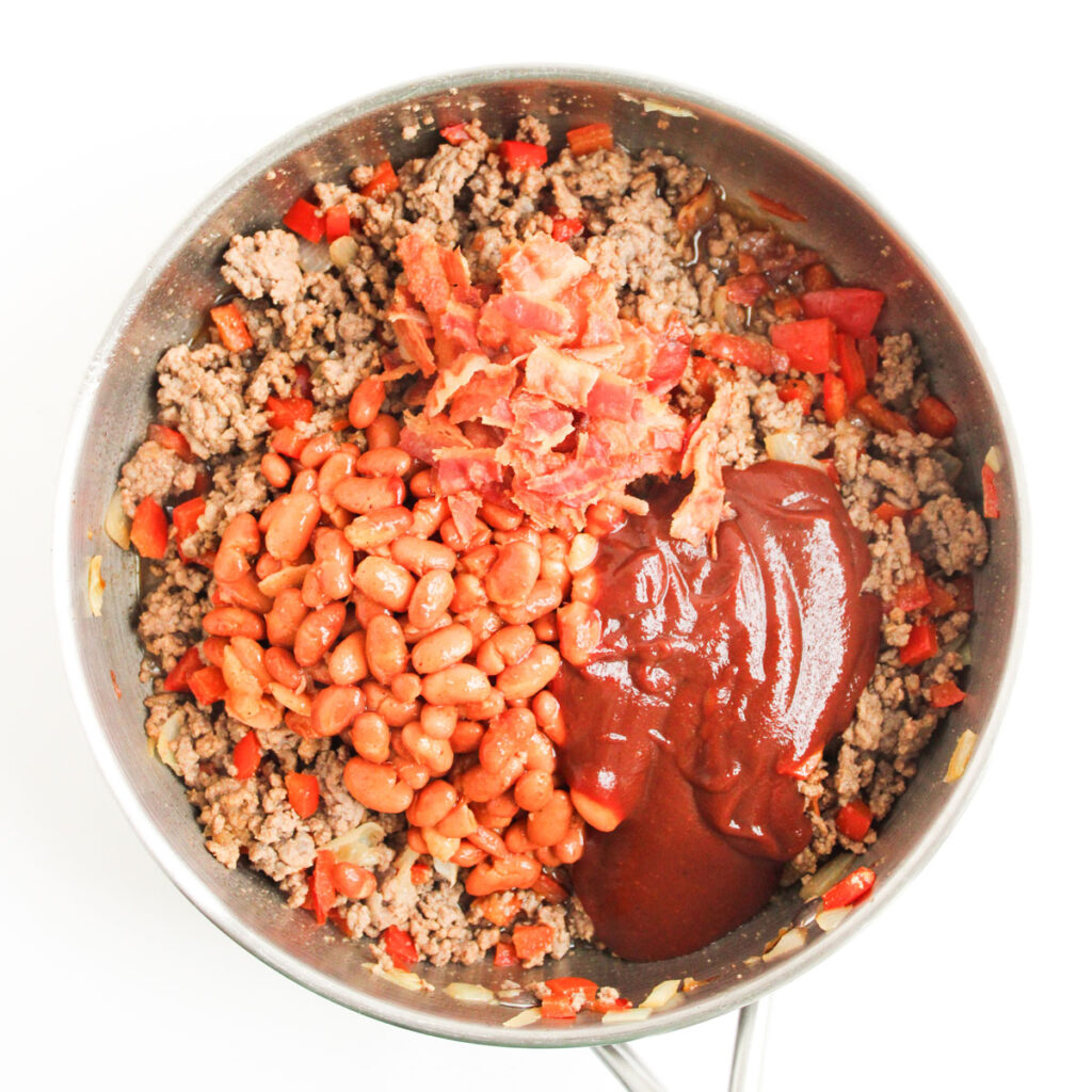 making cowboy casserole in pan