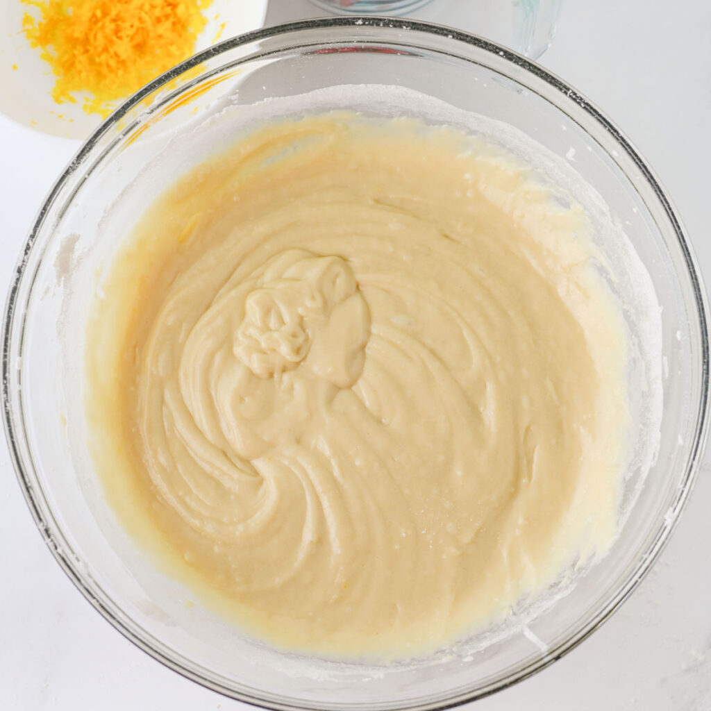 muffin batter in glass bowl