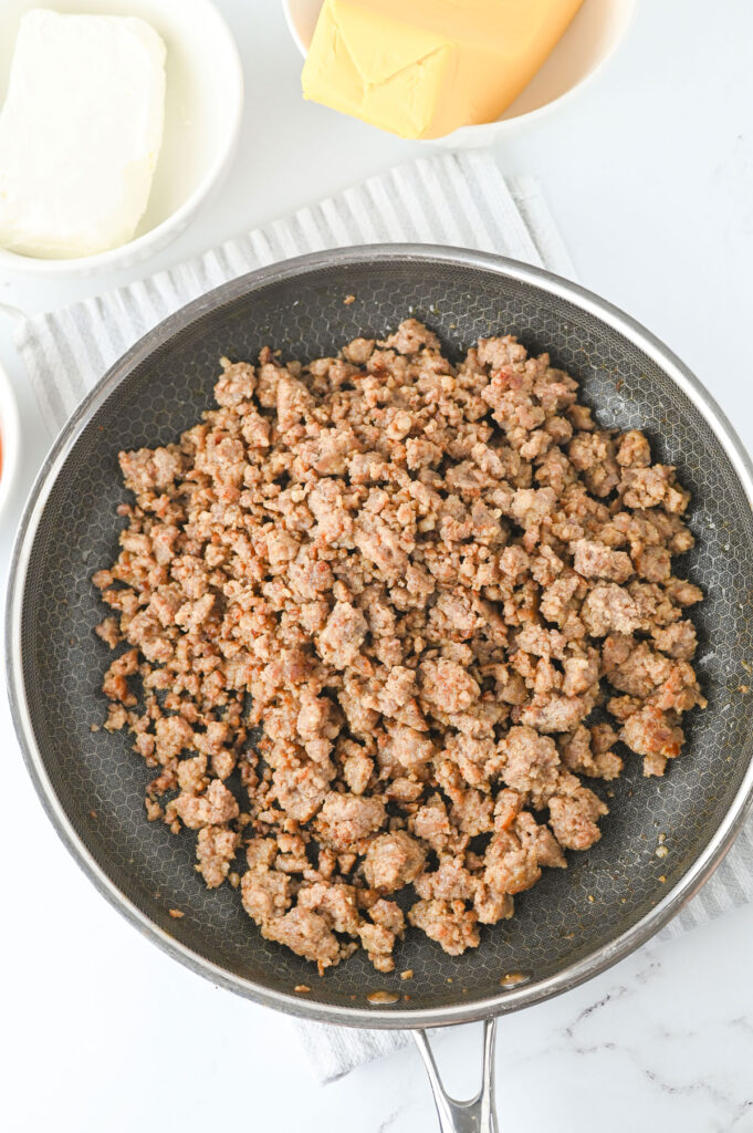 browned sausage in skillet