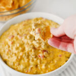 scoop of football dip on corn chip