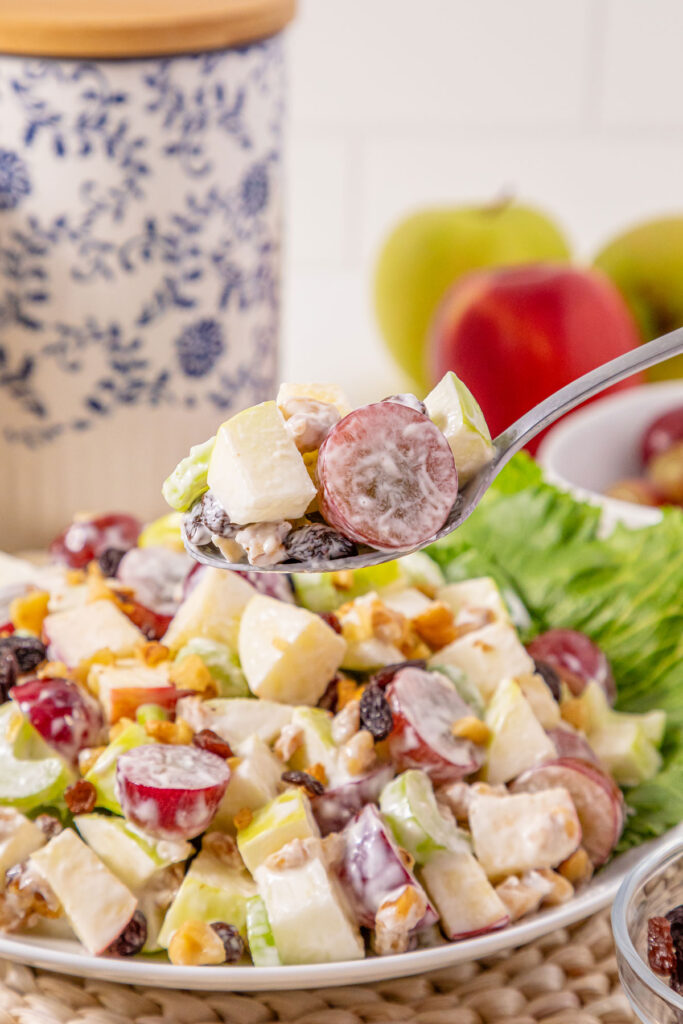 waldorf salad with lettuce on fork