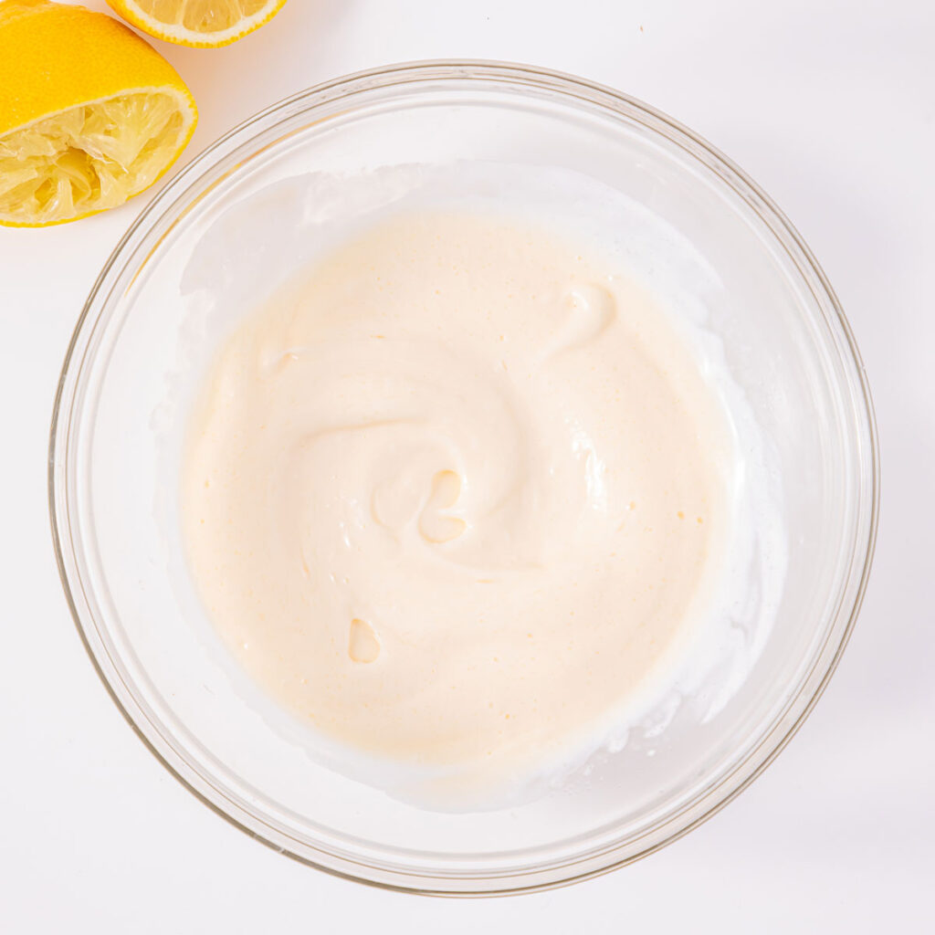 waldorf salad dressing in glass bowl