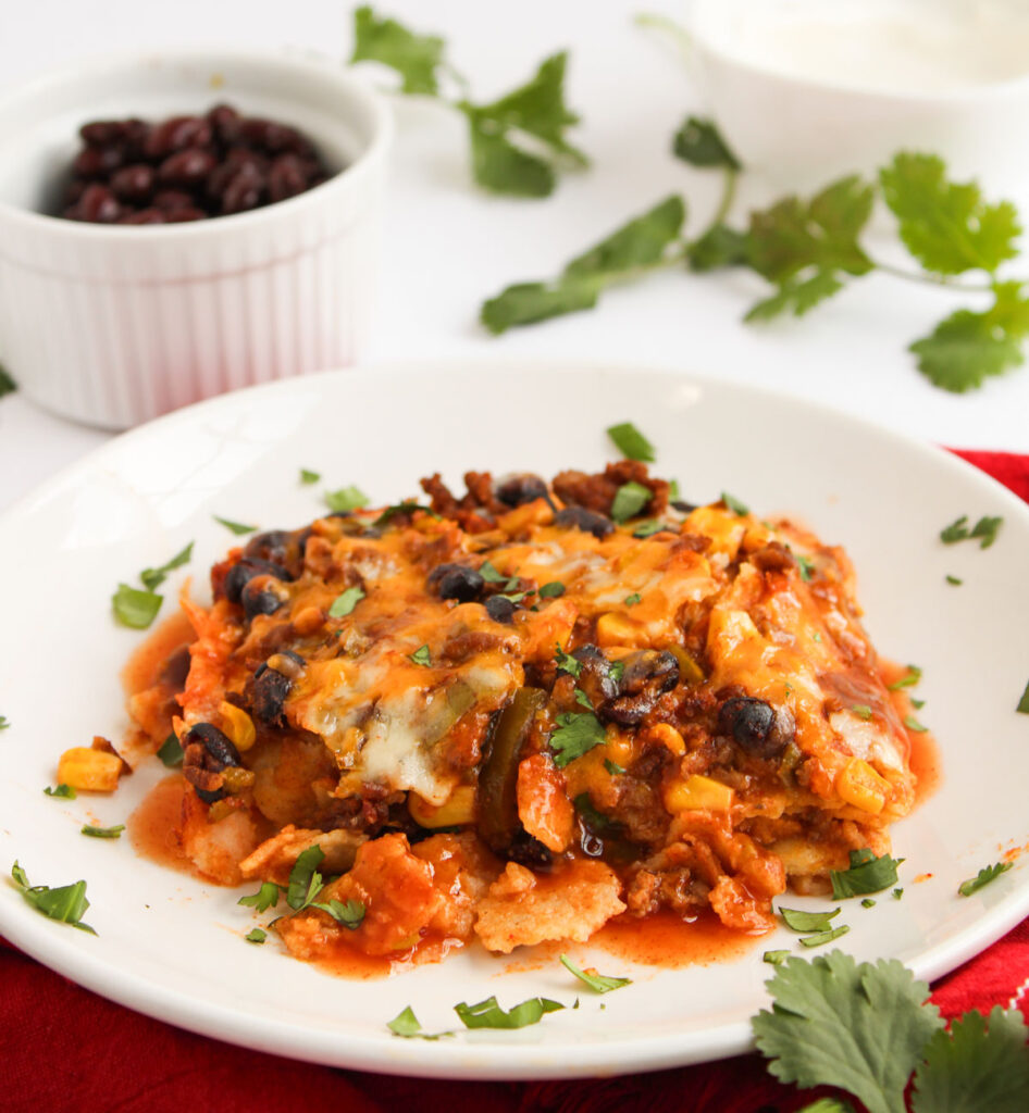 enchilada casserole on white plate