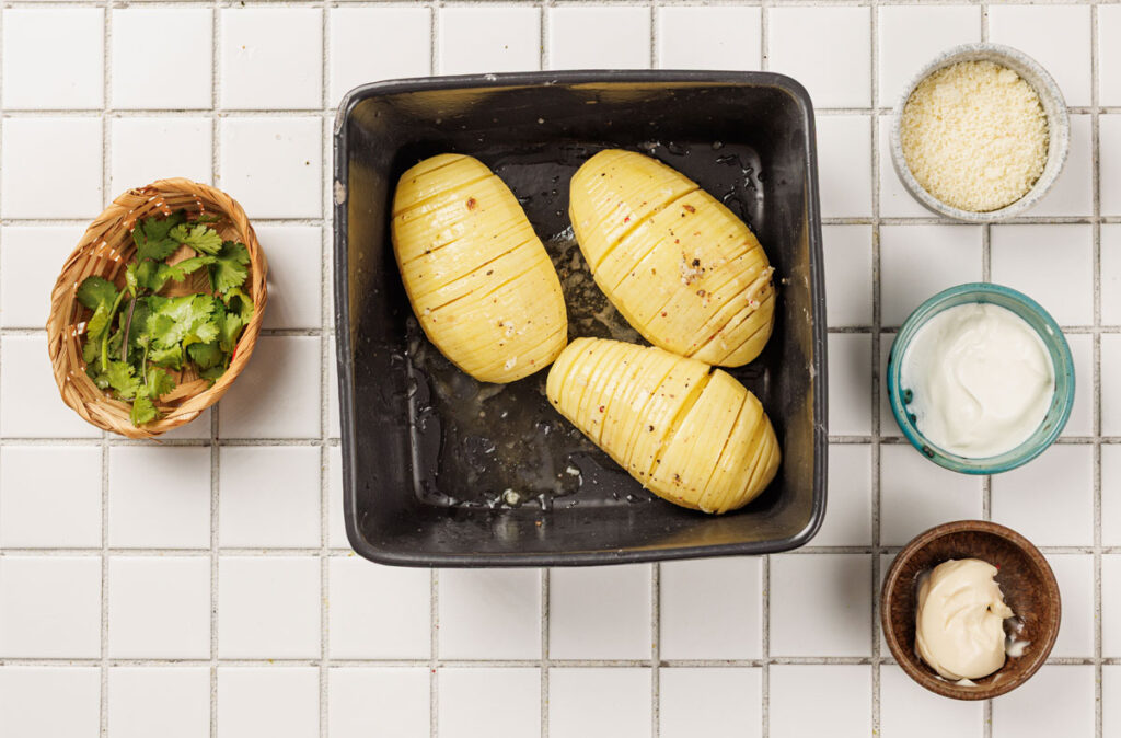 seasoned hasselback potatoes before baking