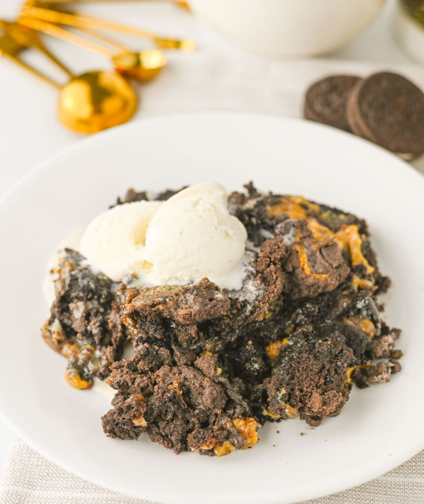 oreo dump cake on white plate