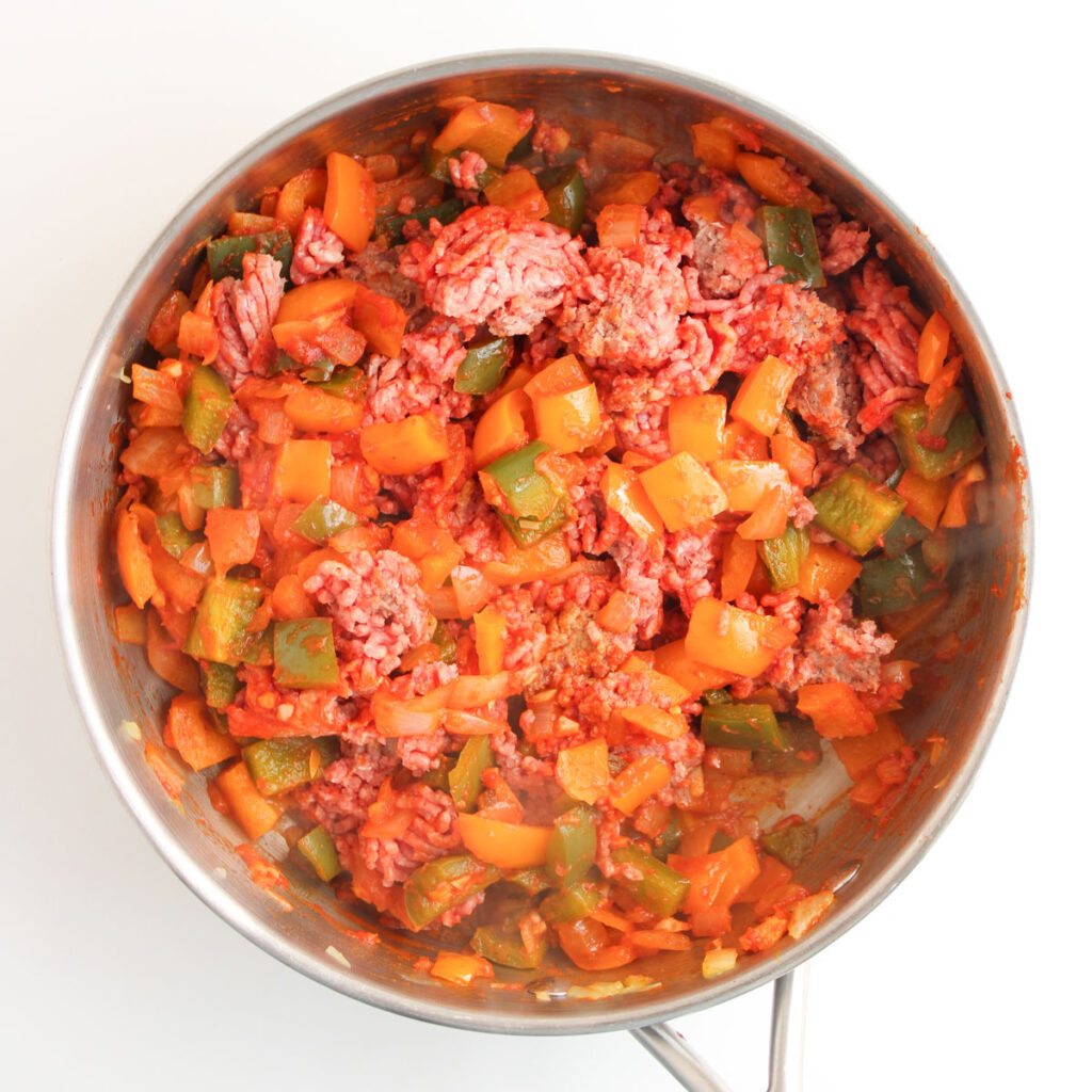 ground beef and vegetables in skillet