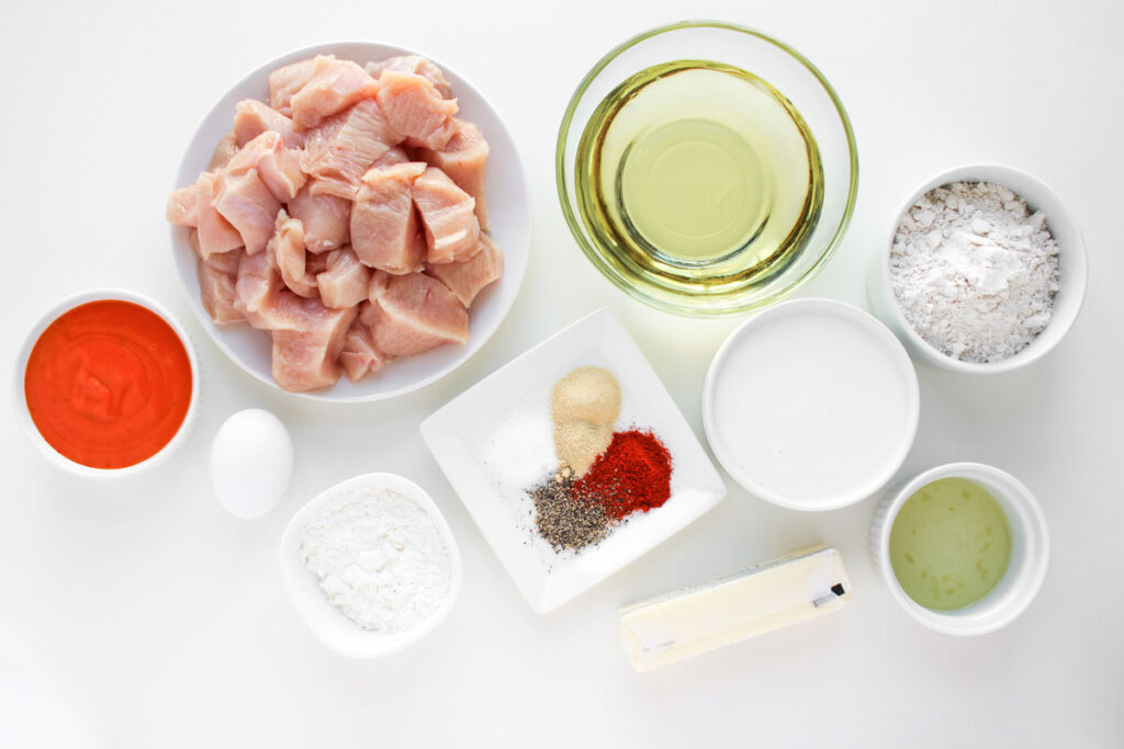 boneless buffalo wings ingredients in bowls on counter