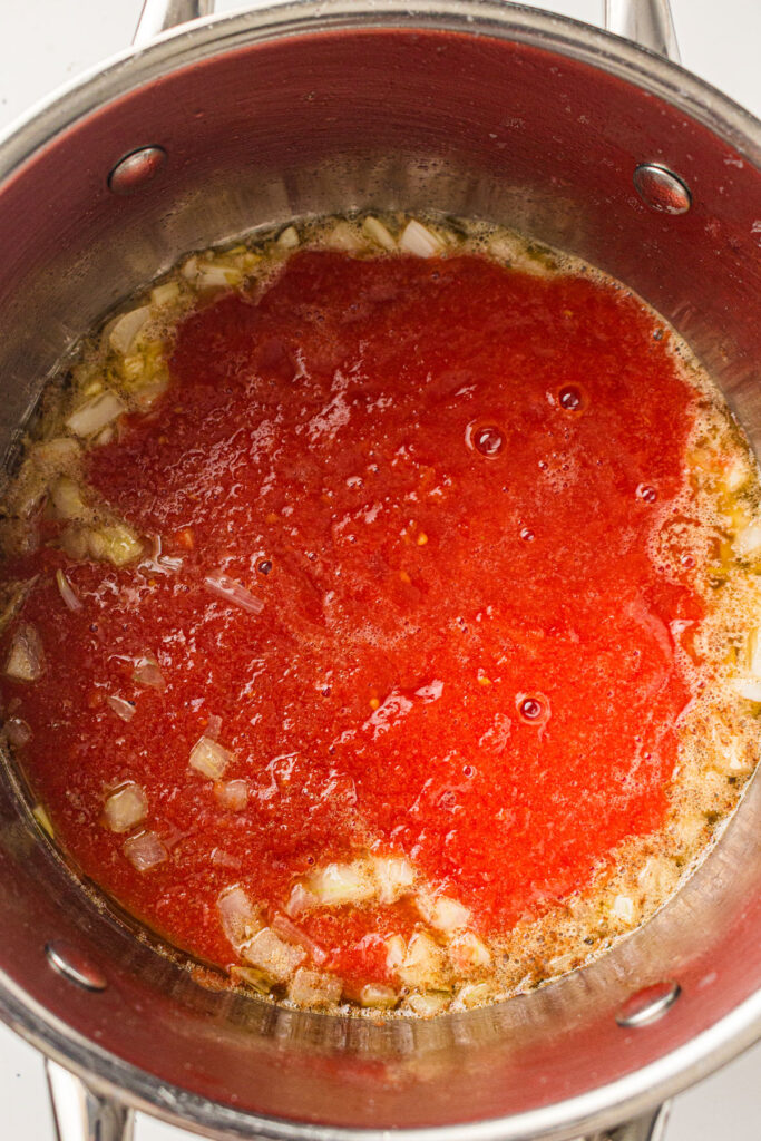 making tomato soup in pot