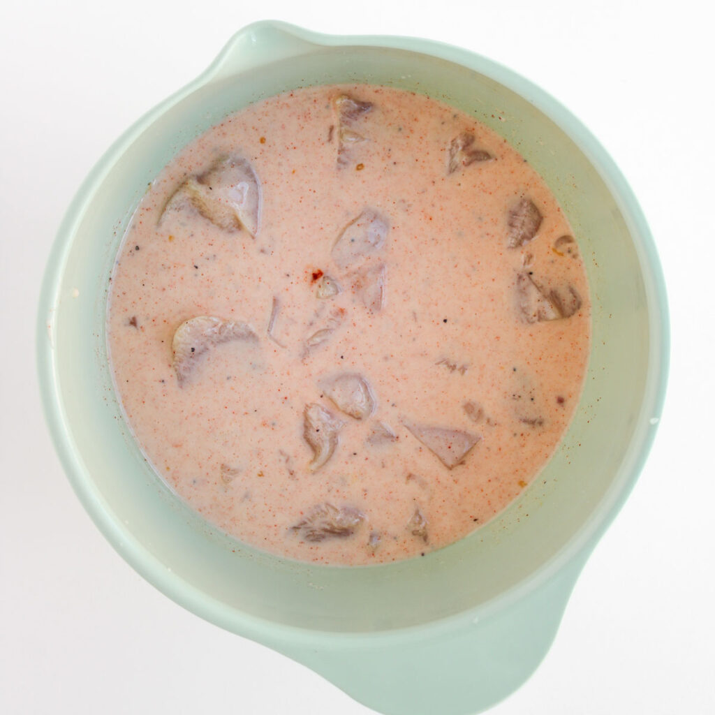 soaking boneless buffalo wings in batter